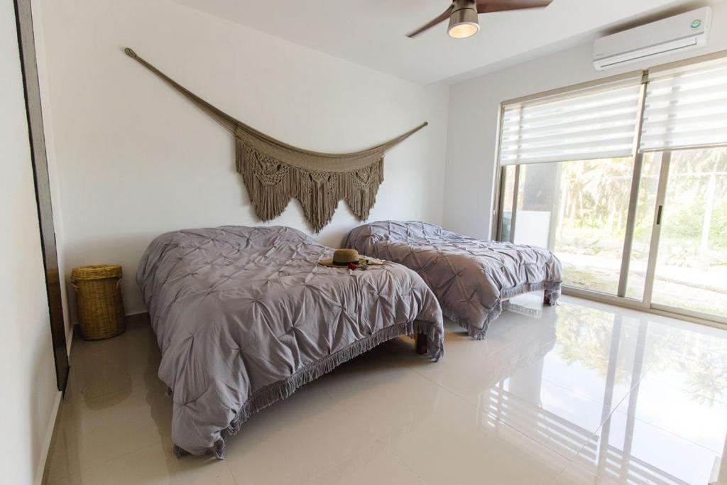 Angelina 28 Beachfront And Family Apartments - Modern And Relaxing Long Stays - 20 Min From Cancun Airport プエルト・モレロス エクステリア 写真